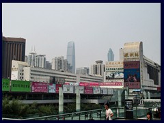 Luohu district: Luohu Station with KK100 and Shun Hing Square dominating Shenzhen's skyline in afar.